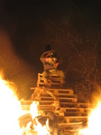 SX16779 Guy holding bomb on bonfire.jpg